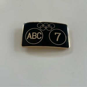 Vintage ABC 7 Olympic Rings Belt Buckle Black Gold TV Network Memorabilia RARE